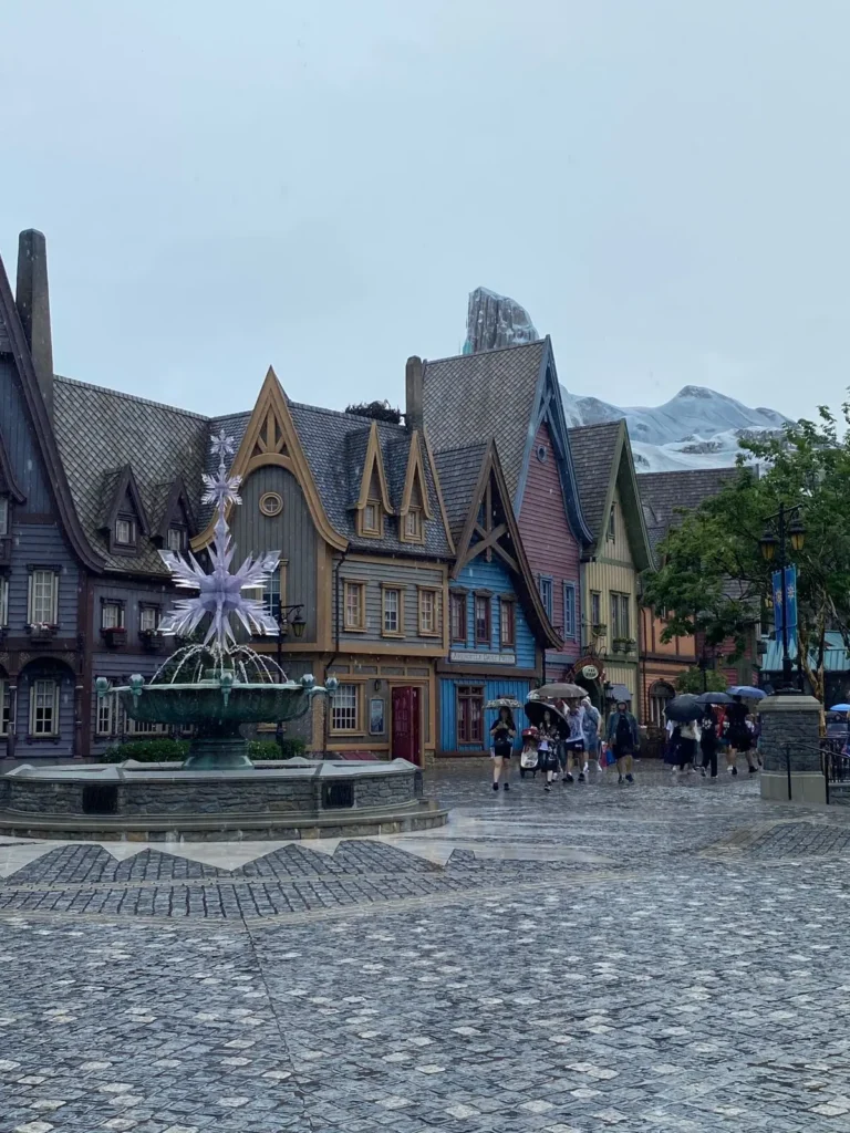 Arendelle village in Hong Kong Disneyland on a rainy day during our family trip with kids.